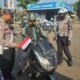 Satlantas Polres Pasuruan Bagikan 1.000 Bendera Merah Putih, Teguhkan Semangat Nasionalisme